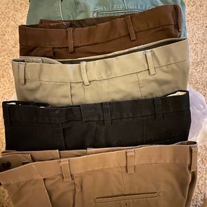 5 pair mens slacks. Haggar and 1 pair Dockers. Size 34waist 29 length